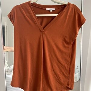 Burnt orange blouse. Fits small / xs. Business casual or casual